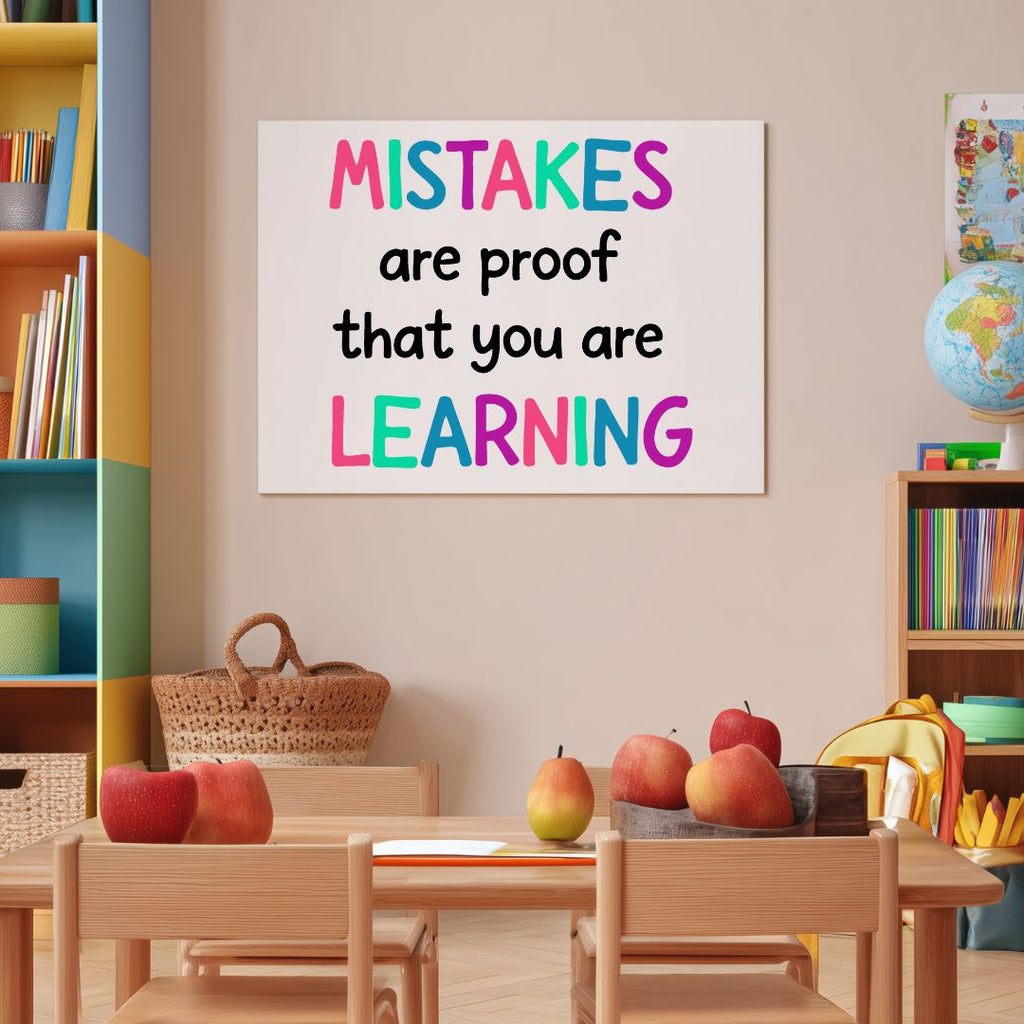Educational setting with a motivational poster that says "Mistakes are Proof that you are Learning" on the wall, books, and apples on a table.
