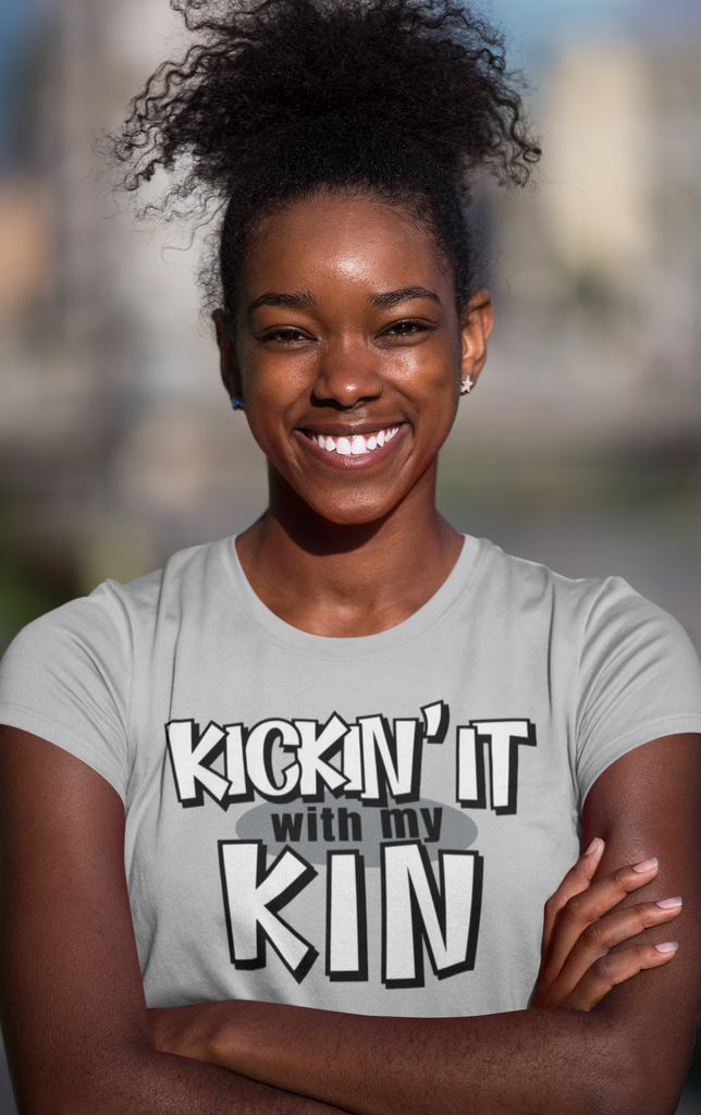 woman with grey shirt displaying the kickin it with my kin design