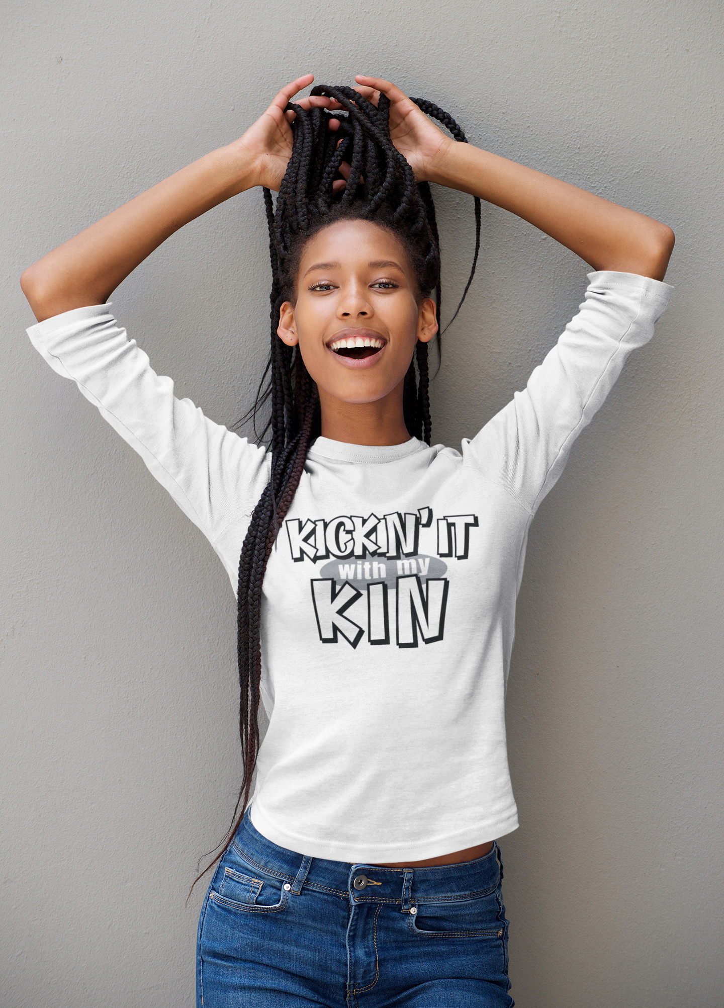 woman with white long sleeved shirt displaying the kickin it with my kin design